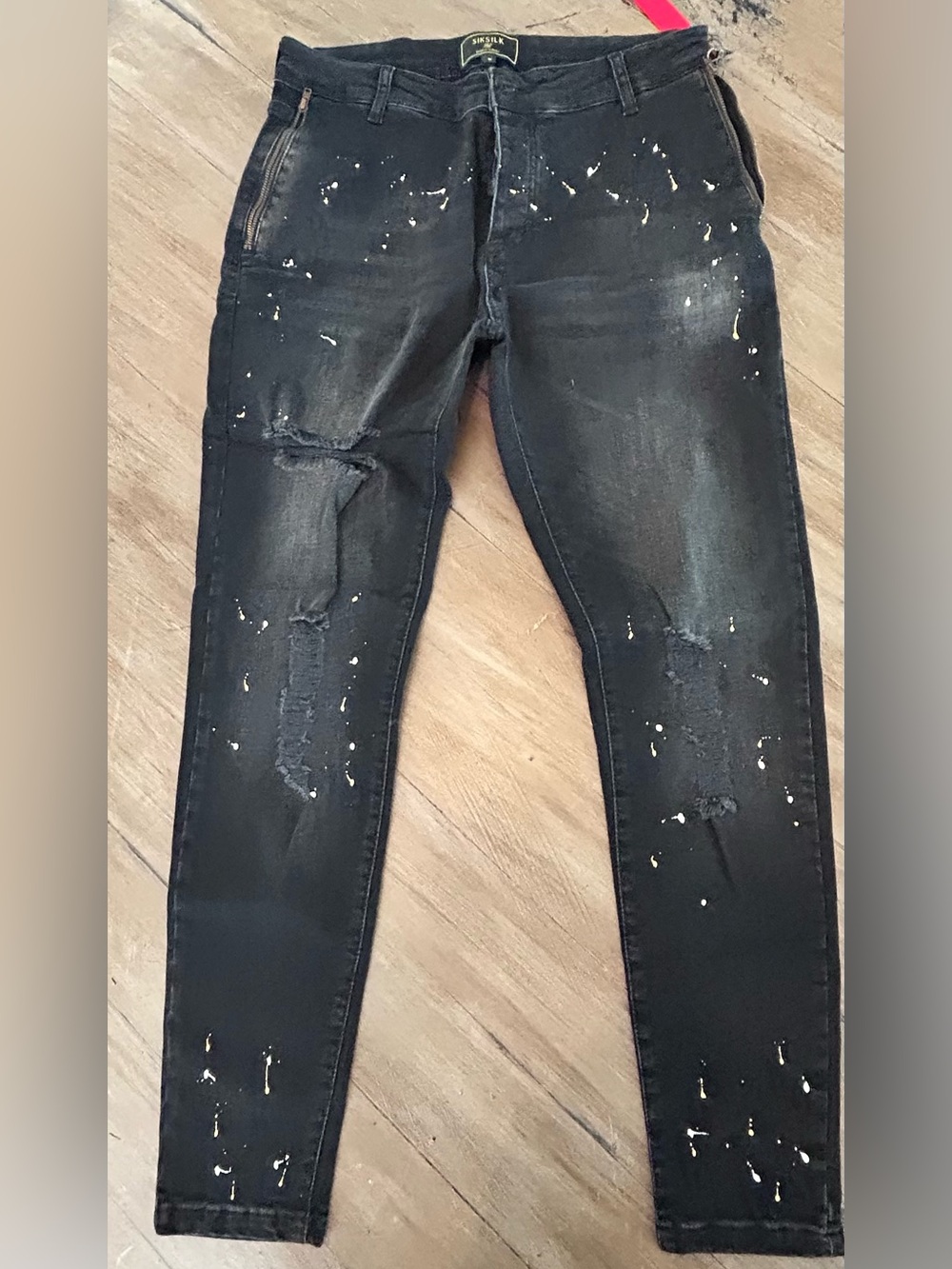 Men's Skinny Black Distressed Jeans with Paint-Splatter Detailing